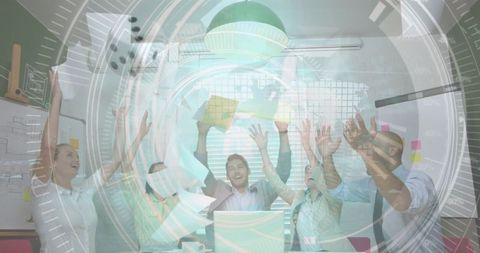 Joyful Business Team Embracing Triumph in Modern Office