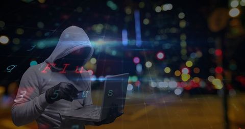 hacker with laptop at night: urban cybersecurity visualization - Download Free Stock Images Pikwizard.com