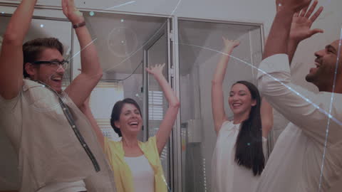 Diverse Team Celebrating Success with Digital Interface Overlay