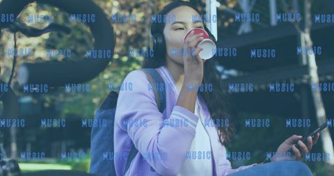 Young Woman Enjoying Coffee and Music Outdoors