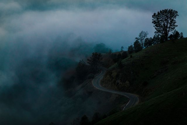 Misty Mountain Road at Dawn - Download Free Stock Photos Pikwizard.com