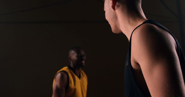 Basketball Players Competing on Indoor Court at Night - Download Free Stock Images Pikwizard.com