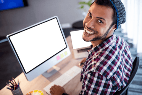 Joyful Man Smiling at Office with Blank Computer Screens - Download Free Stock Videos Pikwizard.com