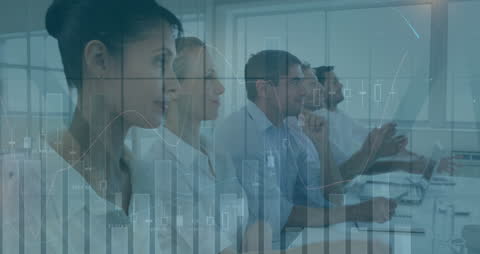 Business Team Analyzing Financial Data with Digital Graphics Overlay