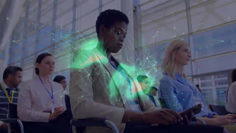 Diverse Team Engaged in Digital Data Network Visualization