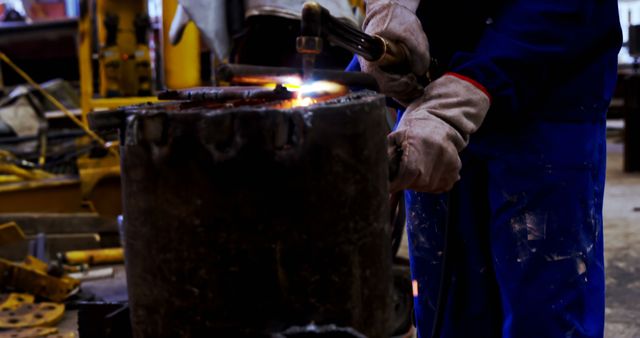 Industrial Worker Welding Metal Wears Safety Gloves and Protective Gear - Download Free Stock Images Pikwizard.com