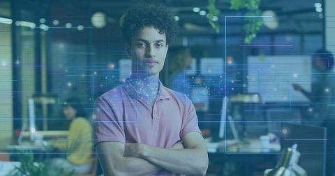 Confident young professional in futuristic office environment