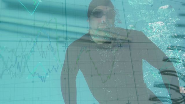 Caucasian man underwater swimming, representations of financial and statistical data digitally overlayed. Can be used for concepts linking sports, physical fitness with financial analysis, business performance, and a data-driven active lifestyle.