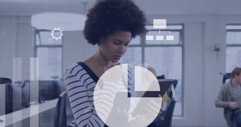 Professional Woman Using Tablet for Office Collaboration