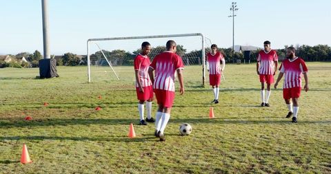Soccer Team Practicing Drills on Field
