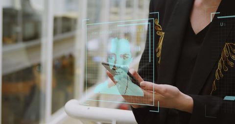 Businesswoman Engaging with Futuristic Digital Interface