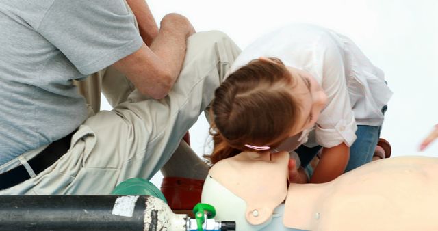 Child Practicing CPR on Dummy During First Aid Training Class - Download Free Stock Images Pikwizard.com