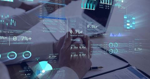 Collaborating Executives Reviewing Financial Analytics with Interactive Dashboard Overlays