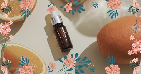 Organic Skincare Spa Essentials Featuring Fresh Oranges and Floral Accents