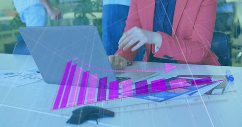 Businesswoman Analyzing Financial Data with Graphs in Modern Office - Download Free Stock Images Pikwizard.com