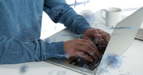 Typing on Laptop with Data Visualization Overlay, Hands Working in Modern Home Office