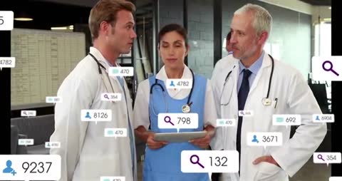 Medical Team Analyzing Digital Data in Clinical Environment