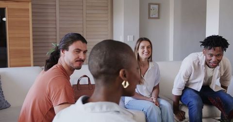 Friends Socializing in Cozy Living Room Setting