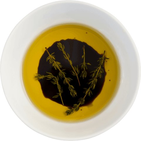 transparent bowl of olive oil with seasoning herbs - Download Free Stock Videos Pikwizard.com