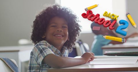 Smiling African American Boy in Classroom for Back to School