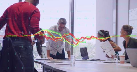 Business Team Analyzing Data with Futuristic Graph Overlay