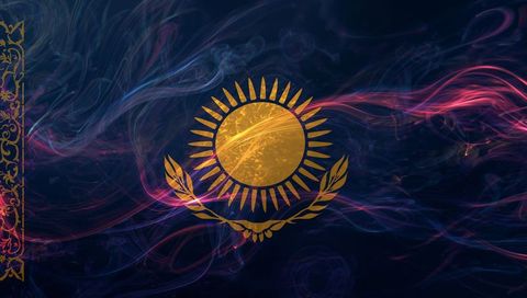 Golden sunburst emblem radiating on dark abstract smoke background with ornate border
