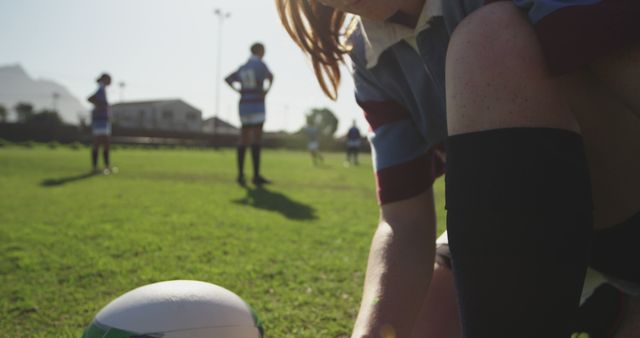 Youth Soccer Player Tying Shoes on Field - Download Free Stock Images Pikwizard.com