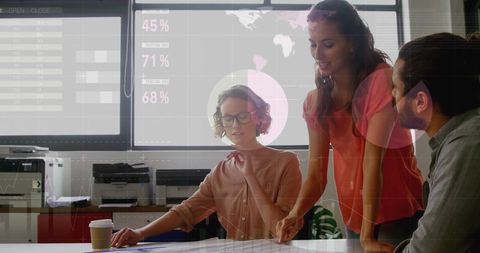 Diverse Team Analyzing Financial Stats in Modern Office Environment