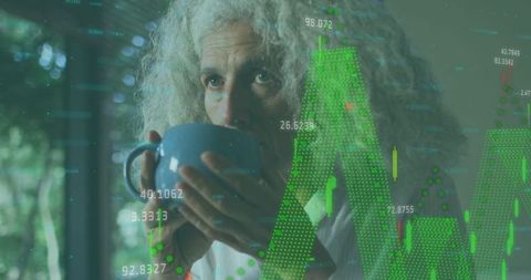Mature Woman Analyzing Financial Data While Relaxing with Coffee