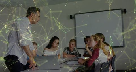 Teacher Engaging Students with Digital Network Overlay - Download Free Stock Images Pikwizard.com