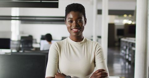 Confident Businesswoman in Modern Office Environment Smiling - Download Free Stock Images Pikwizard.com