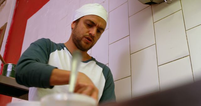 Focused Chef Preparing Meal in Professional Kitchen - Download Free Stock Images Pikwizard.com