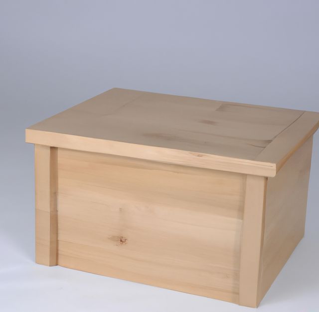 A high-quality wooden storage box with a light wood finish. This simple yet elegant box features clean lines and a smooth surface, suitable for home or office use. It provides a practical solution for organizing items, making it perfect for various applications such as toy storage, keepsake boxes, or tool organizers. Ideal for interior design, home decor, and minimalist theme photography.