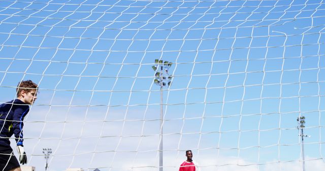 Soccer Players Practicing on Field with Clear Blue Sky - Download Free Stock Images Pikwizard.com