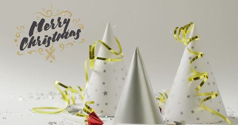 Festive christmas decoration with party hats and confetti