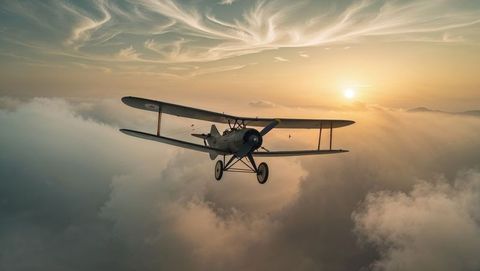 Vintage Biplane Soaring Above Clouds in Golden Sunset - Download Free Stock Images Pikwizard.com