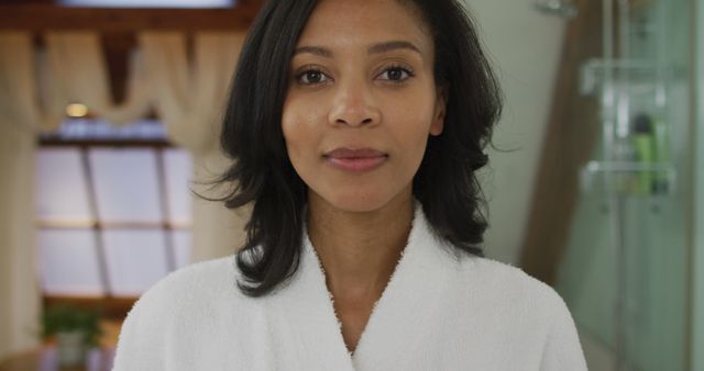 Woman Wearing Bathrobe in Modern Bathroom - Download Free Stock Images Pikwizard.com