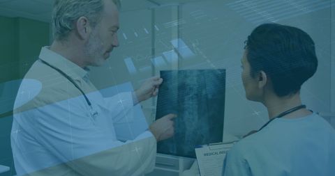Doctors Analyzing X-ray with Digital Interface Overlay - Download Free Stock Images Pikwizard.com