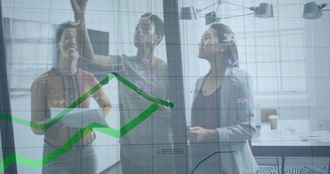 Diverse Female Team Analyzing Data on Transparent Board