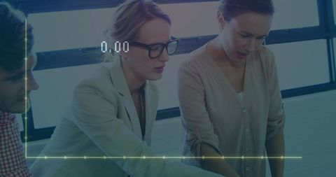 Collaborative Team Discussing Data with Digital Line Graph Overlay