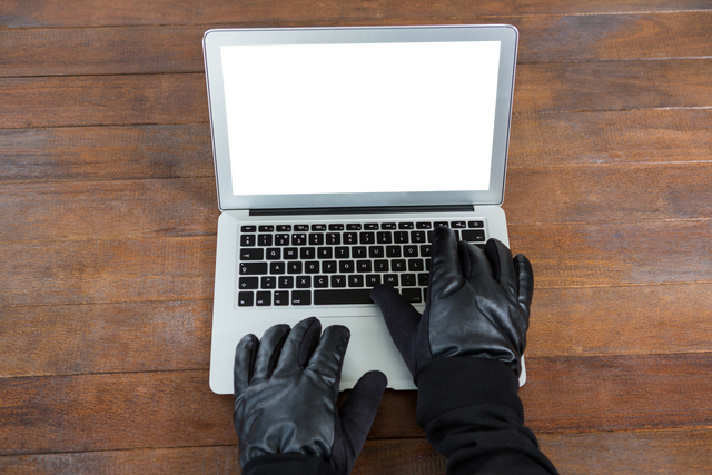 Hacker in Black Gloves Typing on Laptop with Transparent Screen - Download Free Stock Videos Pikwizard.com