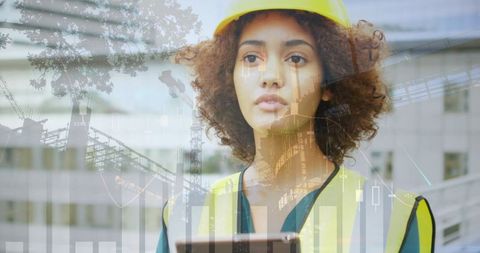 Female architect analyzing data on construction site with technology overlay