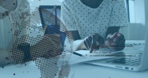 Colleagues Collaborating with Digital Globe Overlay in Modern Office