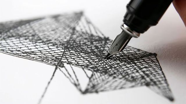 Artist drawing dense crosshatched geometric star pattern with fountain pen nib closeup