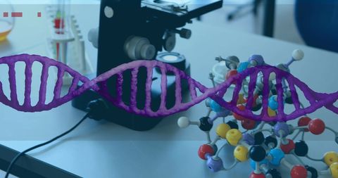 Microscope and molecular models in scientific laboratory