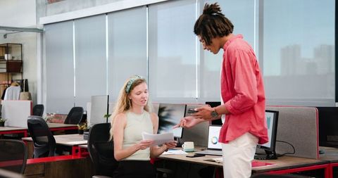 Colleagues Collaborating on Business Project in Office Setting