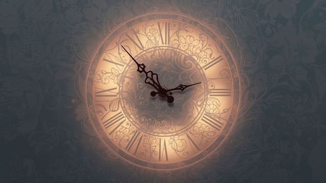 Ornate vintage clock with warm backlighting decor