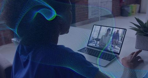 Woman Engaged with Digital Technology in Modern Workspace