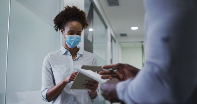 Healthcare Worker Documenting Information on Tablet in Medical Office - Download Free Stock Images Pikwizard.com