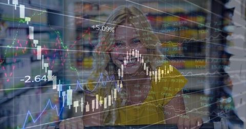 Smiling woman pushing shopping cart through supermarket aisle with financial data overlay